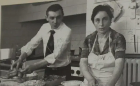 Piera and Giacomo in the restaurant kitchen