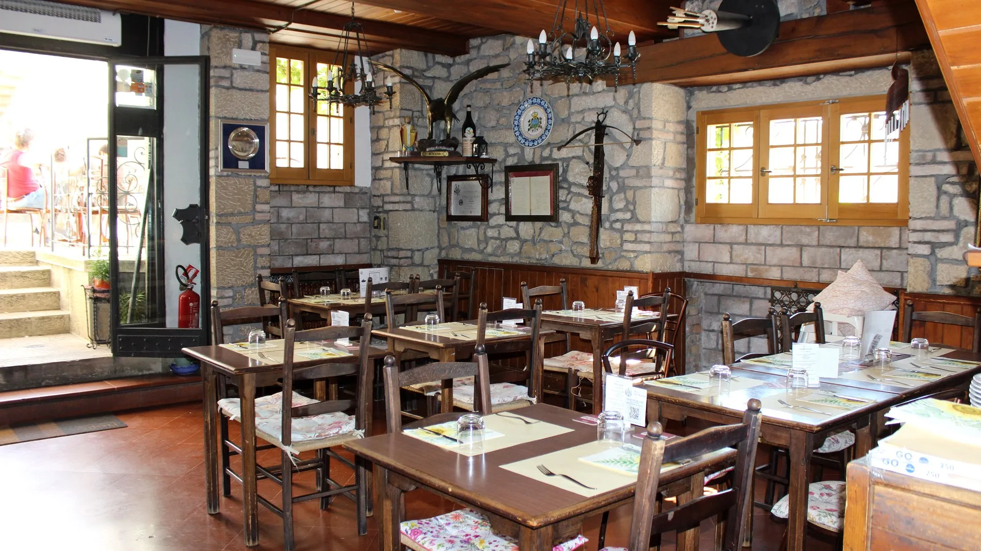 Stone and wood dining room at Buca San Francesco