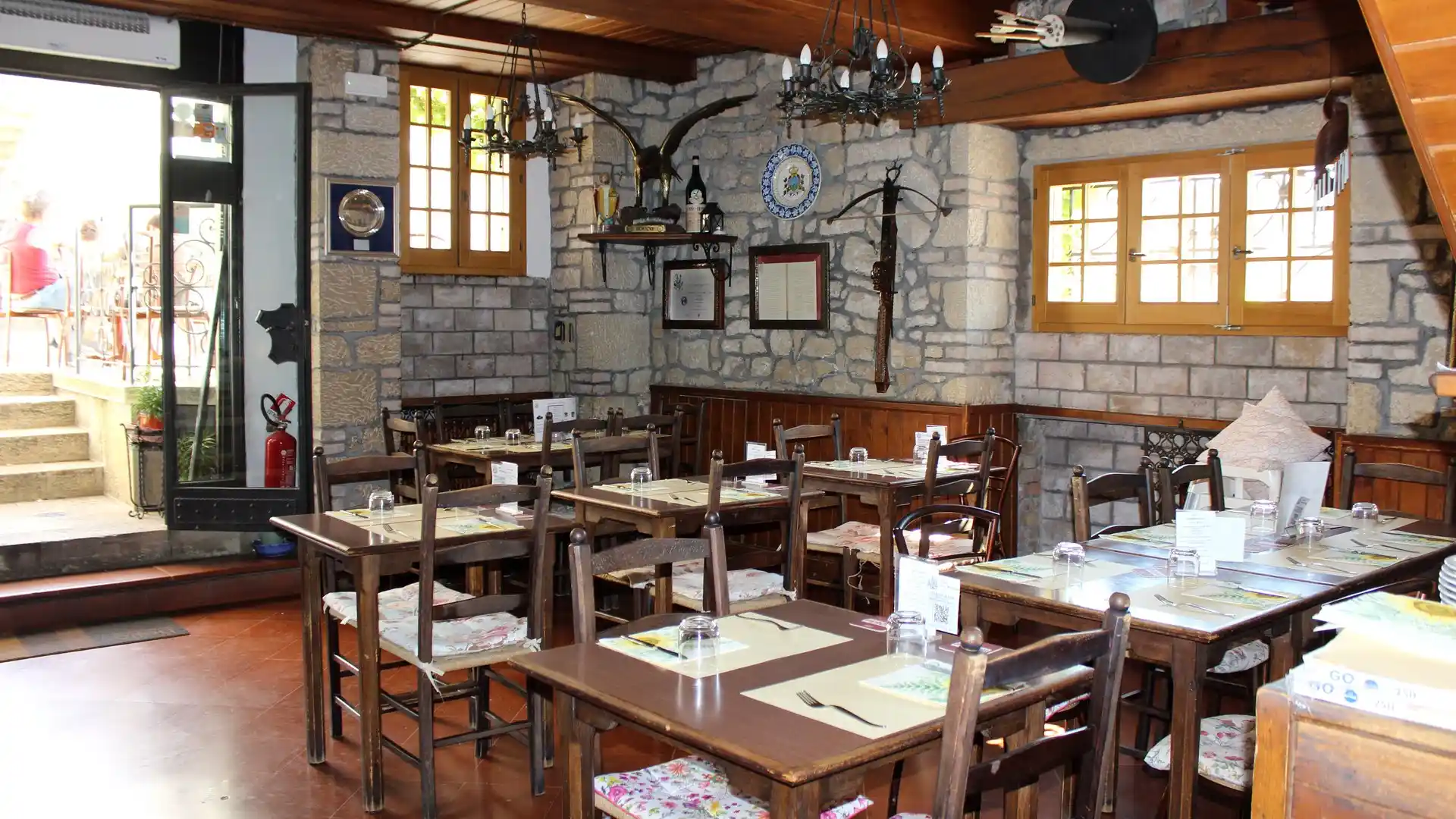 Stone and wood dining room at Buca San Francesco